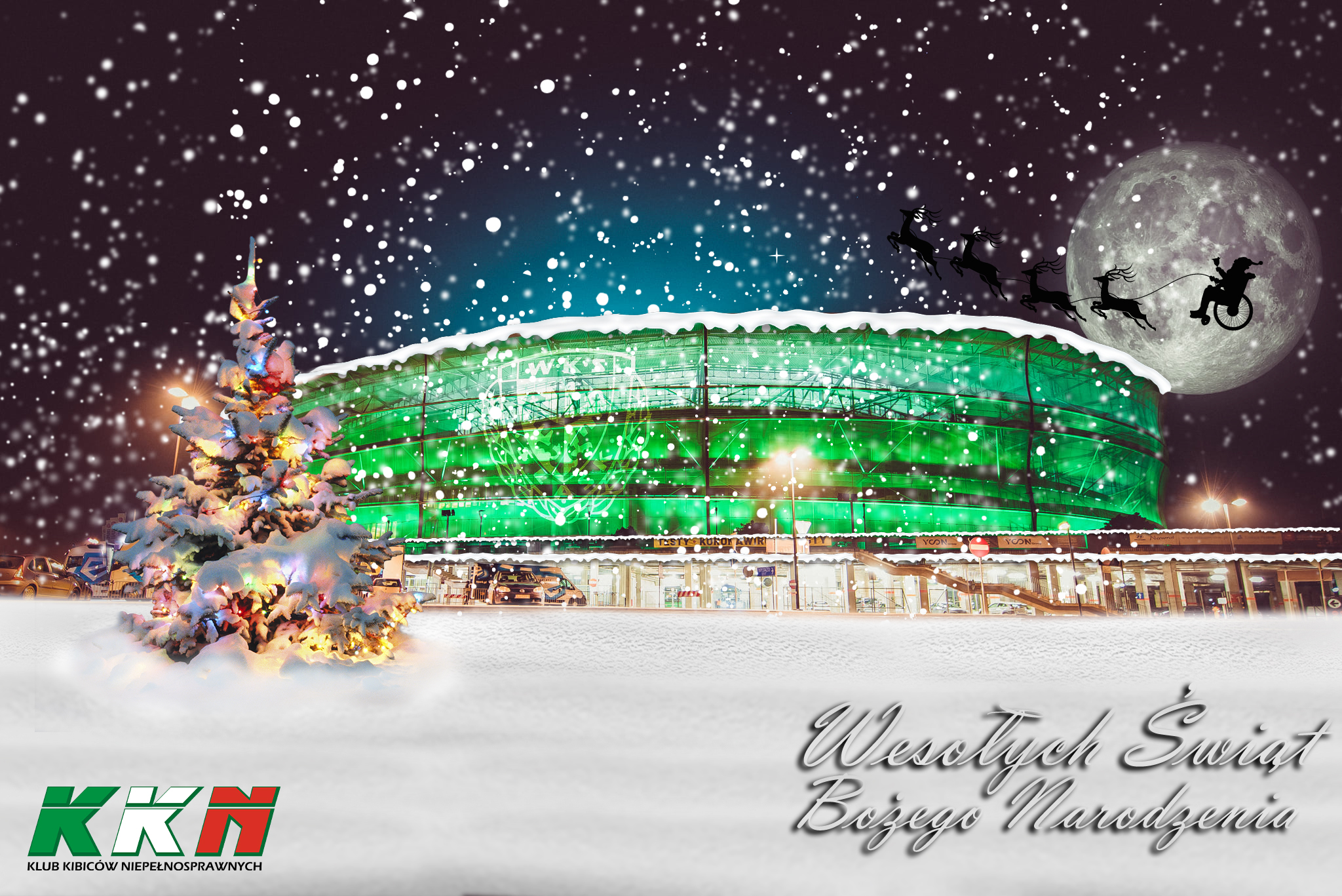 Kartka z życzeniami na Boże Narodzenie. Na grafice podświetlony na zielono stadion, po lewej choinka, na dole napis: Wesołych Świąt Bożego Narodzenia.